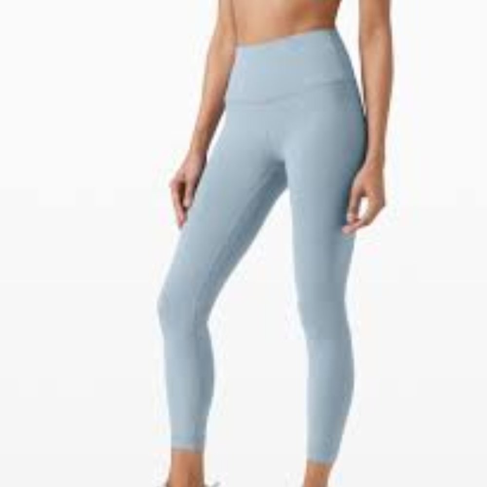 LULULEMON WUNDER TRAIN BABY BLUE HIGH RISE DRAWSTRING ANKLE CUT LEGGINGS - 10